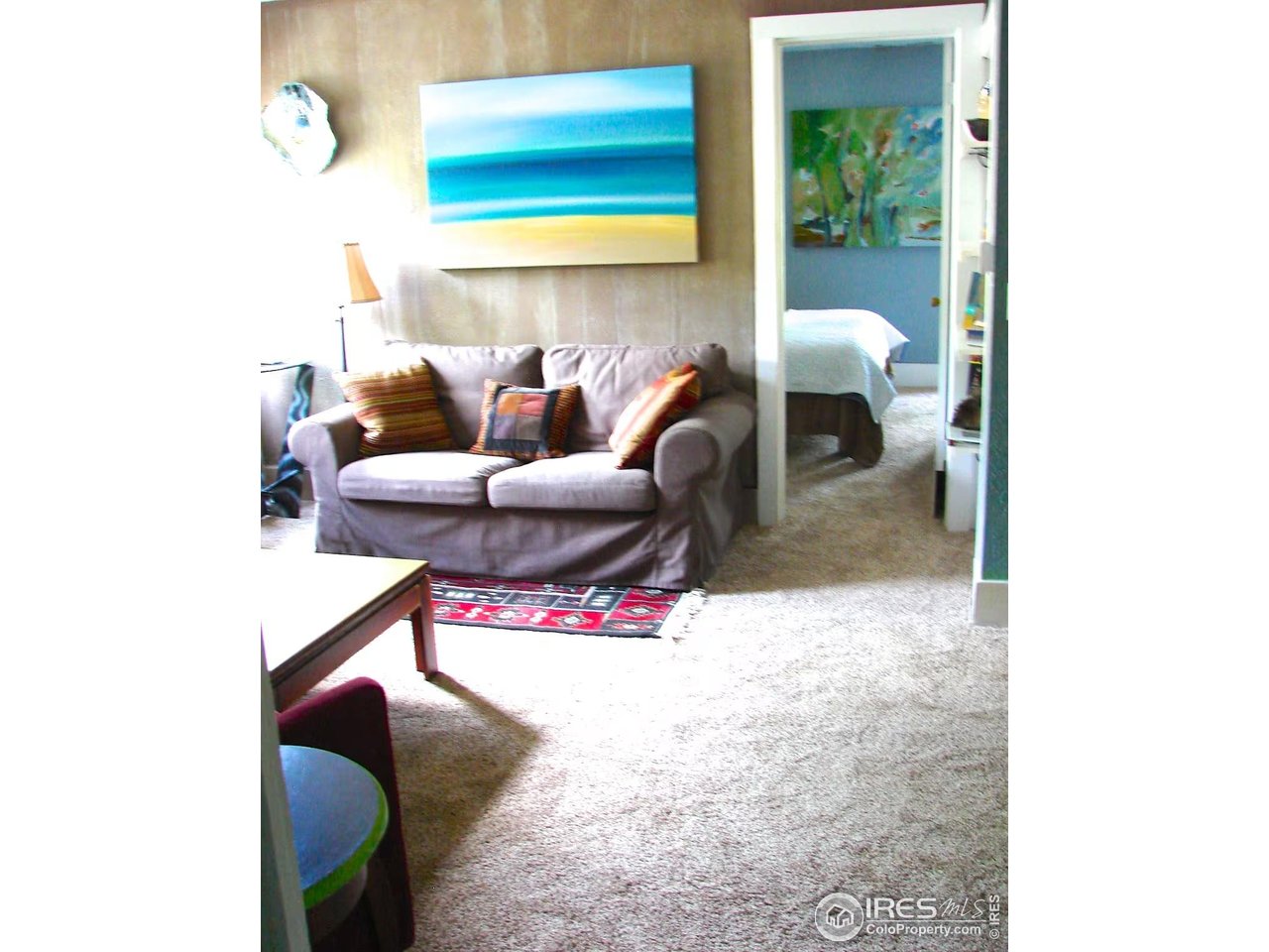 636 Marine Street Boulder, CO 80302 - Photo 32 of 46 a living room with furniture and white walls