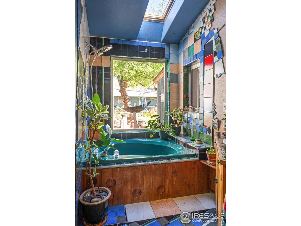 636 Marine Street Boulder, CO 80302 - Photo 38 of 46 a living room with furniture and a potted plant