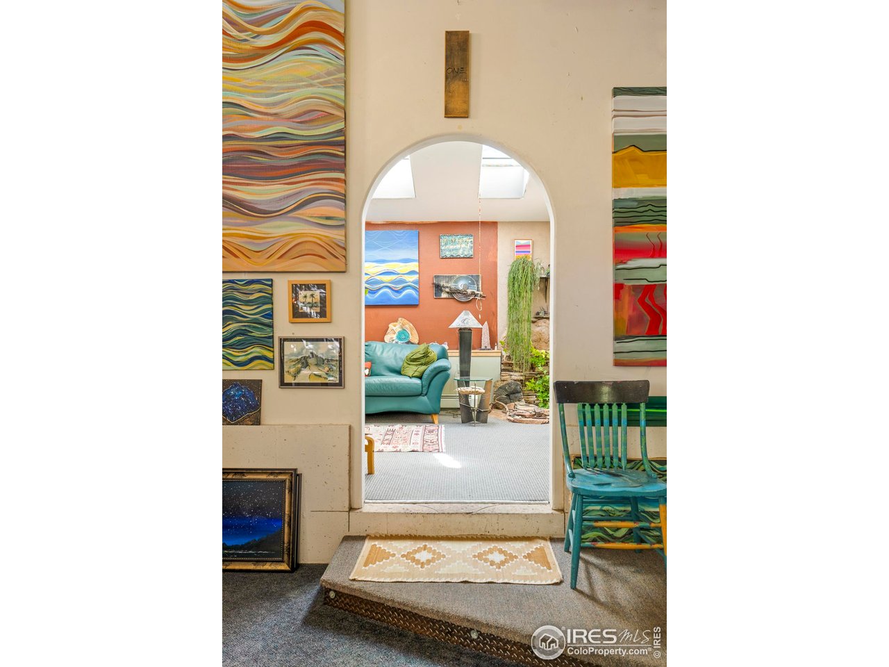 636 Marine Street Boulder, CO 80302 - Photo 40 of 46 a living room with furniture and a floor to ceiling window
