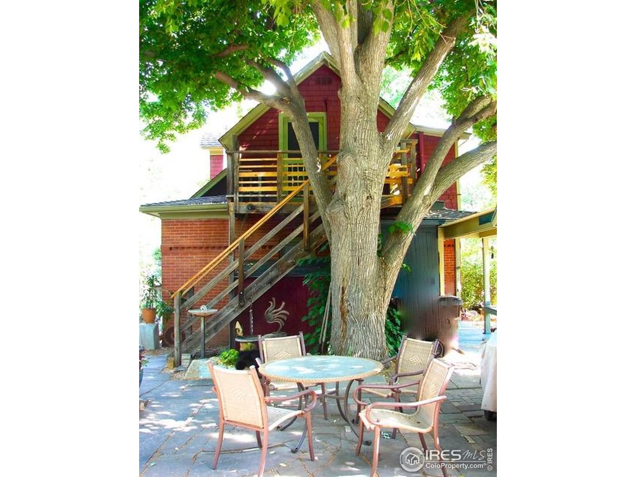 636 Marine Street Boulder, CO 80302 - Photo 6 of 46 a view of a chairs and table in the balcony