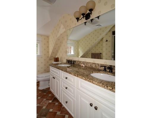 33 Cottage Street Wellesley, MA 02482 - Photo 13 of 23 a bathroom with a double vanity sink mirror and