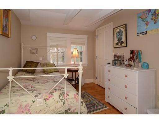 33 Cottage Street Wellesley, MA 02482 - Photo 16 of 23 a living room with furniture and mirror