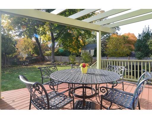 33 Cottage Street Wellesley, MA 02482 - Photo 20 of 23 a view of a patio with a table chairs and a backyard