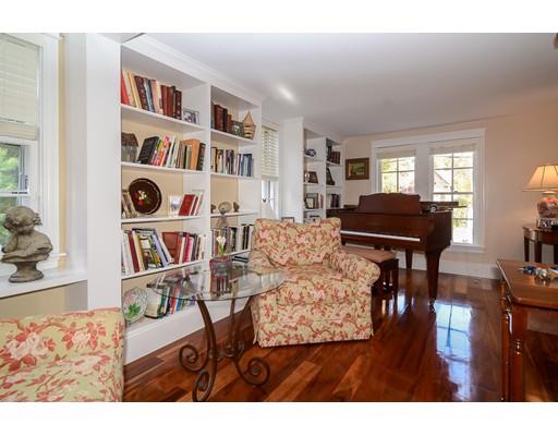 33 Cottage Street Wellesley, MA 02482 - Photo 4 of 23 a living room with furniture and a book shelf