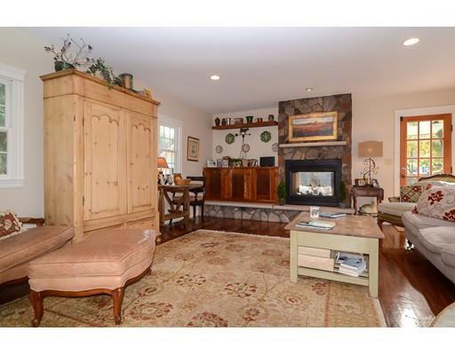 33 Cottage Street Wellesley, MA 02482 - Photo 9 of 23 a living room with furniture and a fireplace