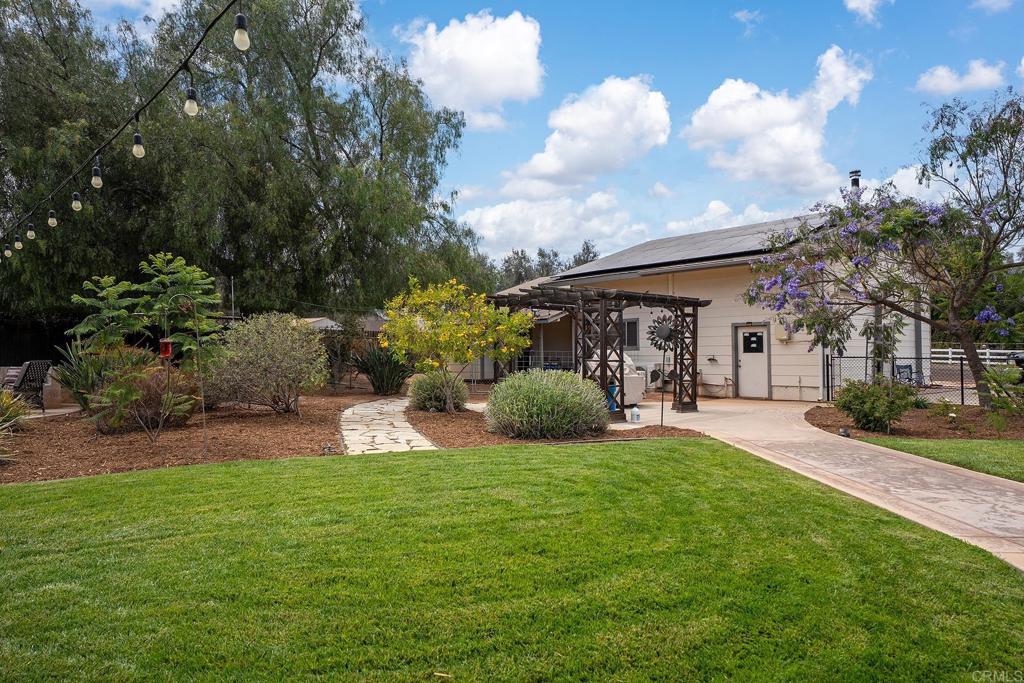 2430 Geyer Lane Alpine, CA 91901 - Photo 43 of 60 a view of a house with backyard porch and garden
