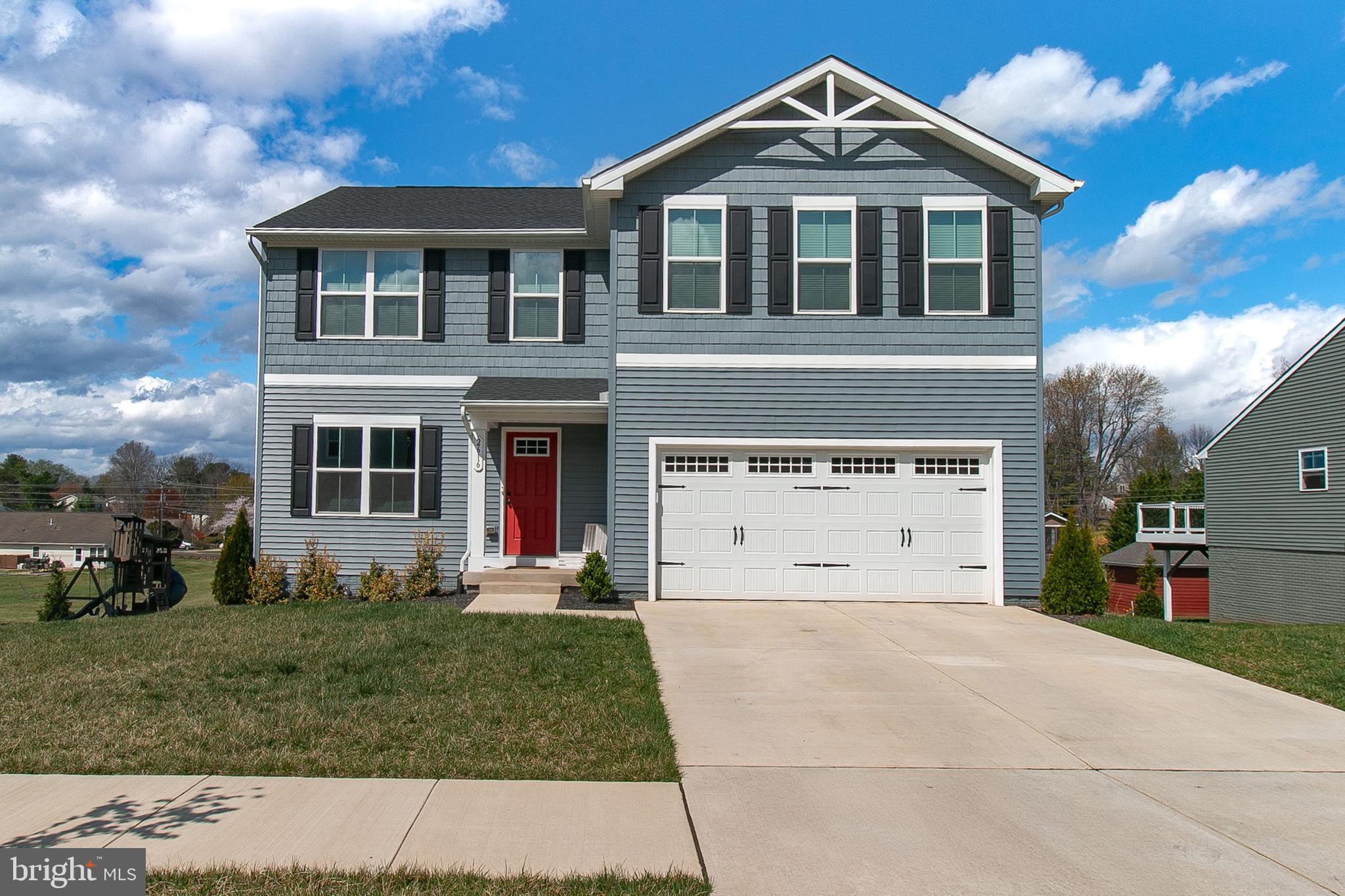 2616 High Point Drive Culpeper, VA 22701 - Photo 1 of 40 a front view of a house with a yard