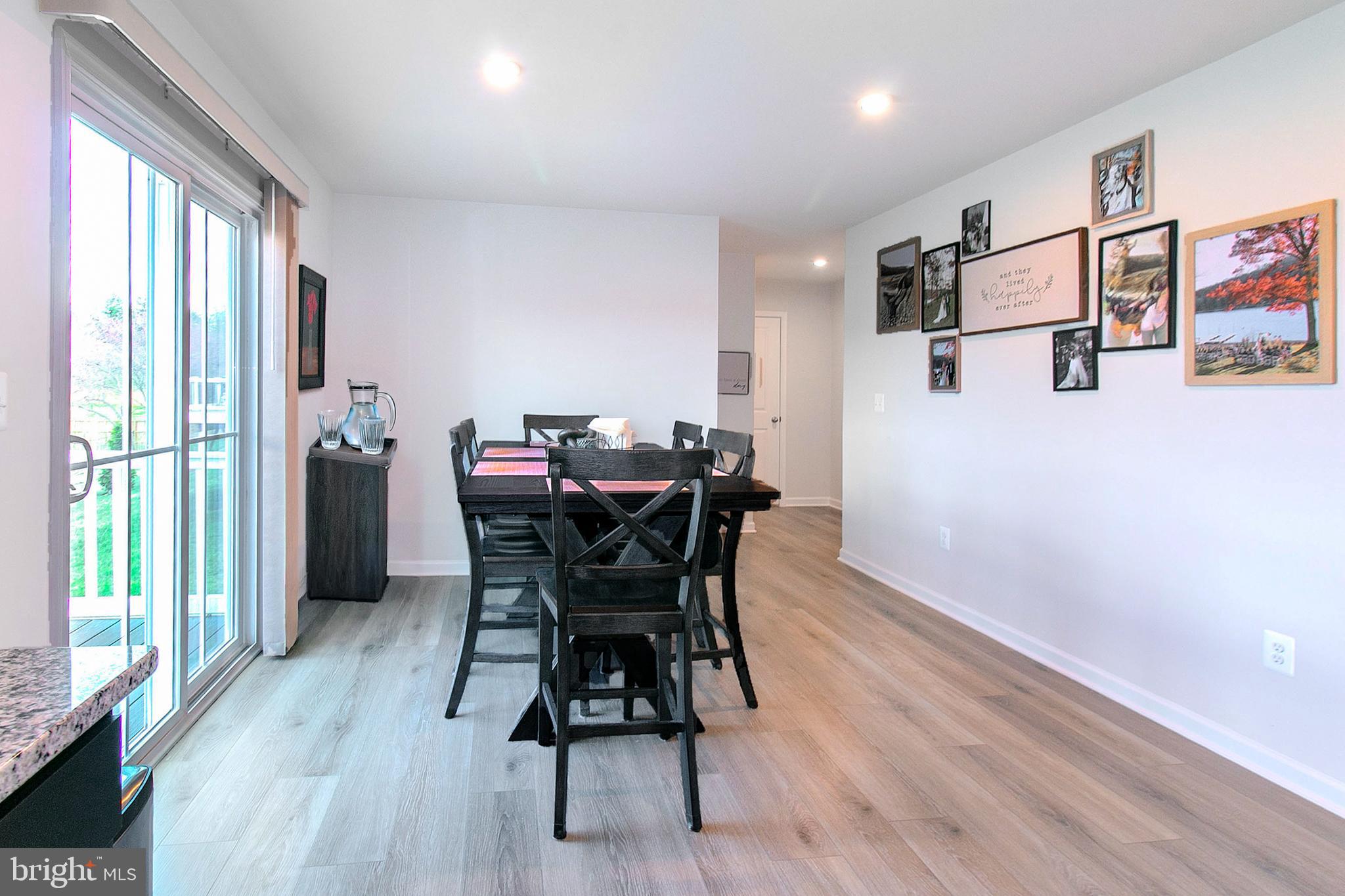 2616 High Point Drive Culpeper, VA 22701 - Photo 13 of 40 a dining room with furniture and wooden floor