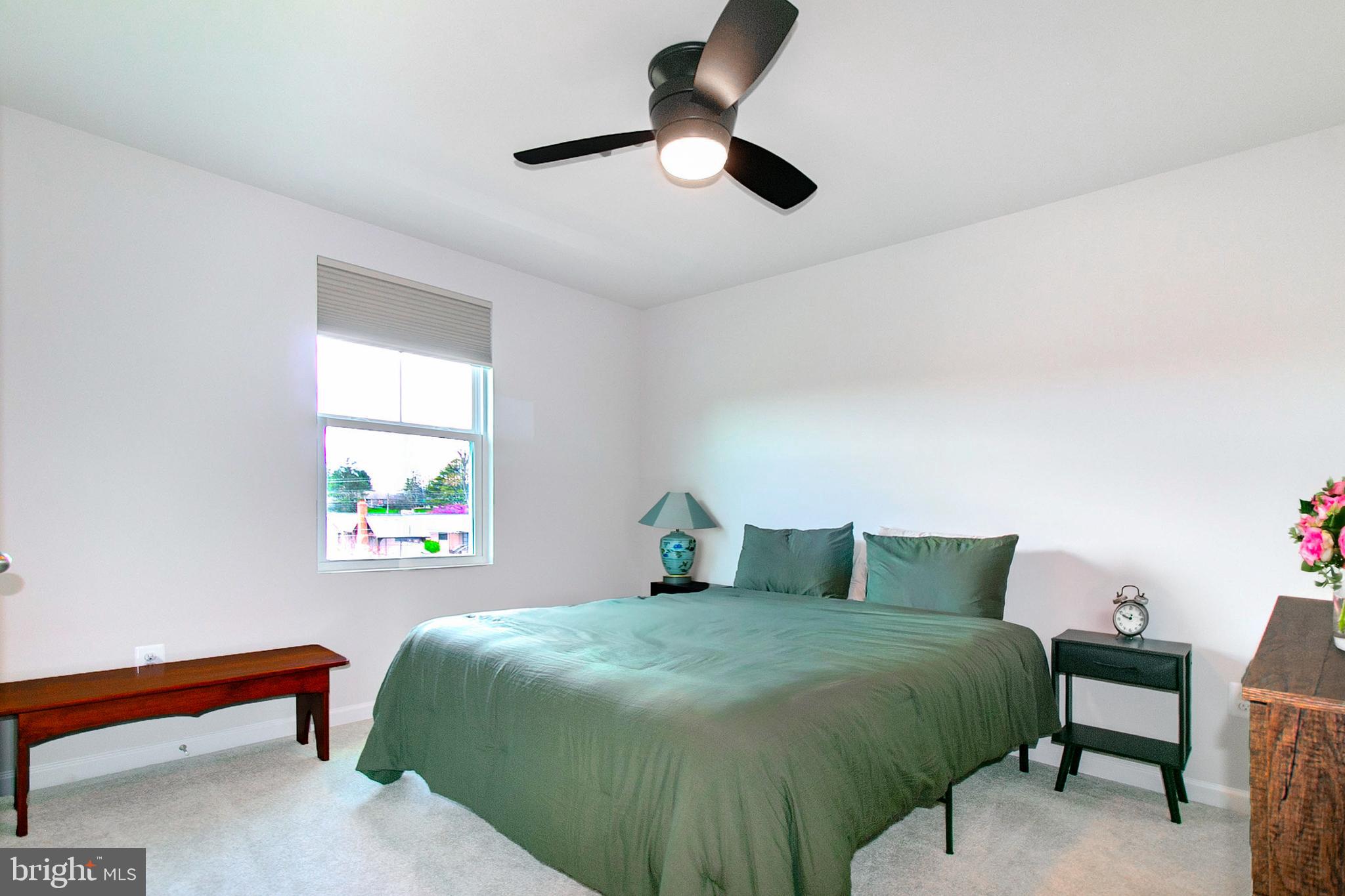 2616 High Point Drive Culpeper, VA 22701 - Photo 32 of 40 a bedroom with a bed and a window
