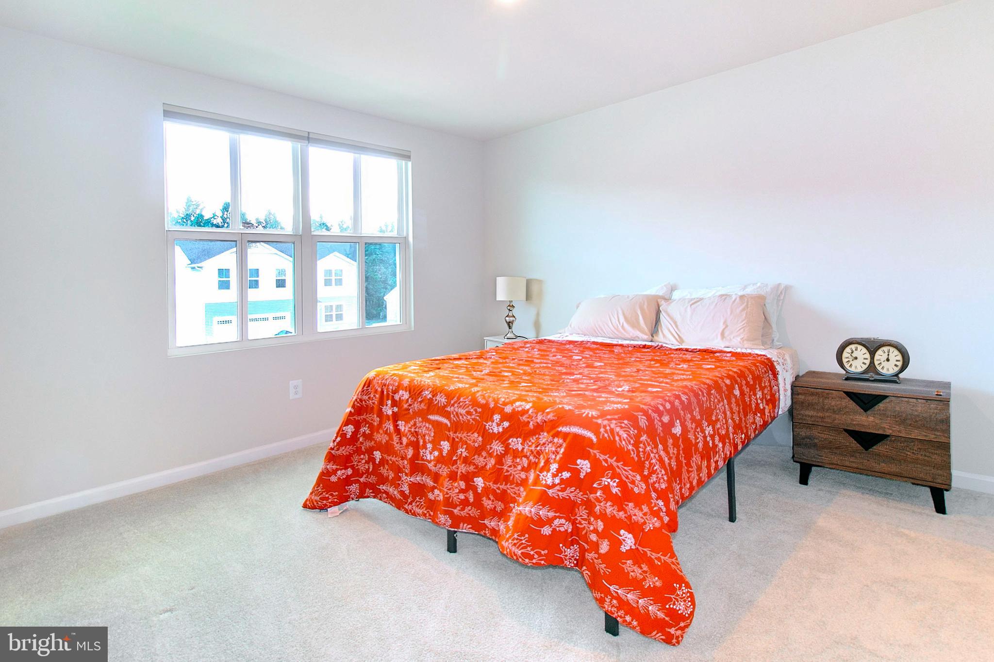 2616 High Point Drive Culpeper, VA 22701 - Photo 33 of 40 a bedroom with a bed and a window