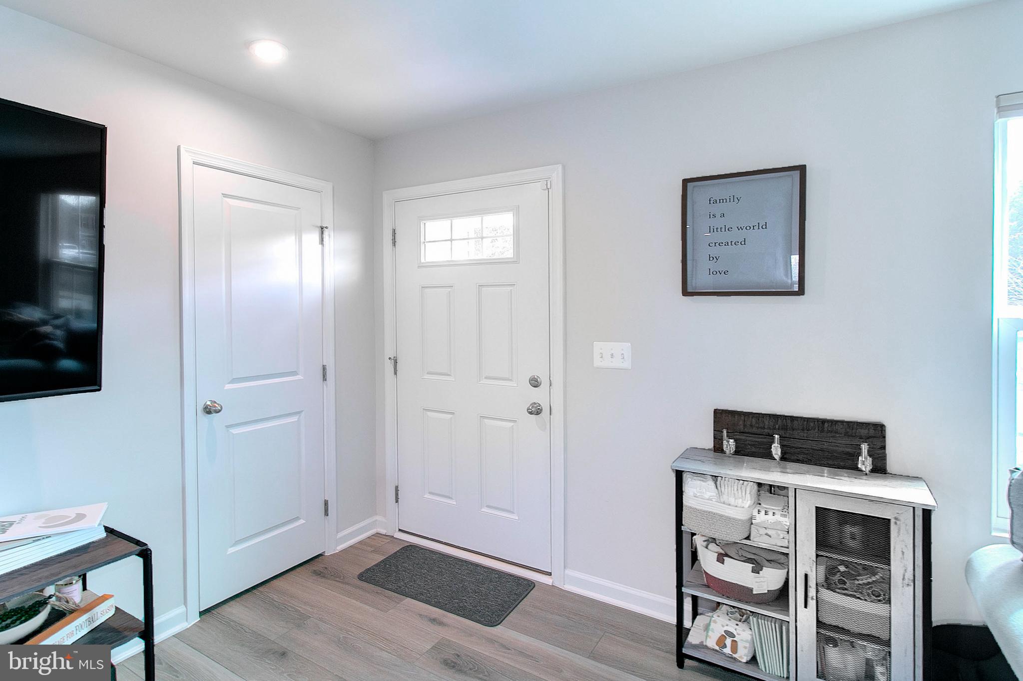 2616 High Point Drive Culpeper, VA 22701 - Photo 4 of 40 a view of workspace with wooden floor cabinet and window