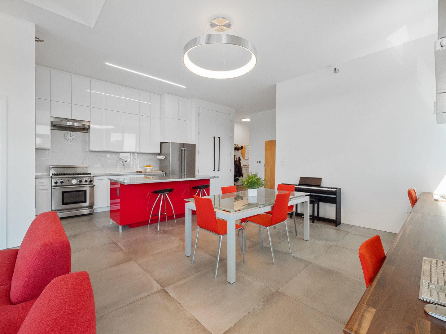 321 South Sangamon Street, Unit 905 Chicago, IL 60607 - Photo 11 of 36 a living room with stainless steel appliances kitchen island granite countertop furniture and a kitchen view