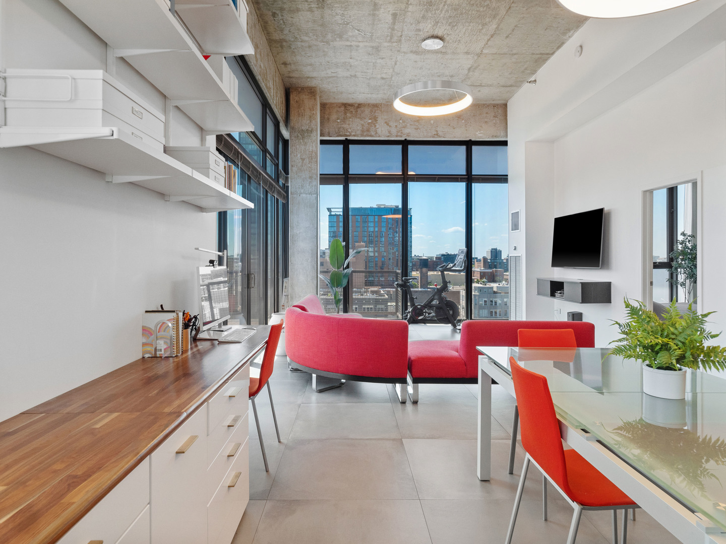 321 South Sangamon Street, Unit 905 Chicago, IL 60607 - Photo 13 of 36 a reading room with furniture and a flat screen tv