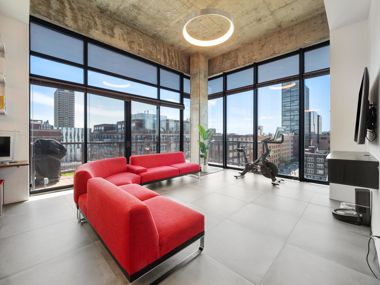 321 South Sangamon Street, Unit 905 Chicago, IL 60607 - Photo 14 of 36 a living room with furniture and a floor to ceiling window