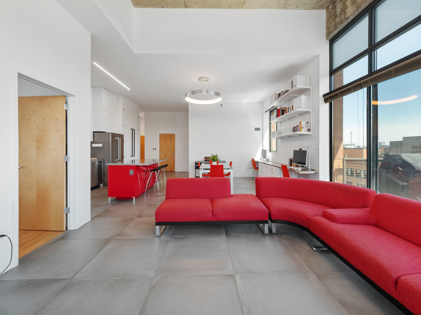 321 South Sangamon Street, Unit 905 Chicago, IL 60607 - Photo 16 of 36 a living room with furniture and a floor to ceiling window