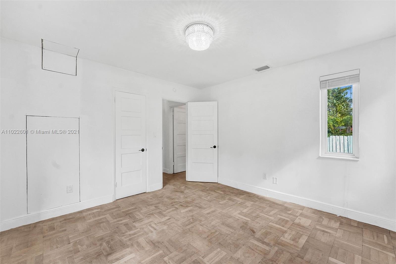 4717 Alton Road Miami Beach, FL 33140 - Photo 29 of 59 a view of an empty room