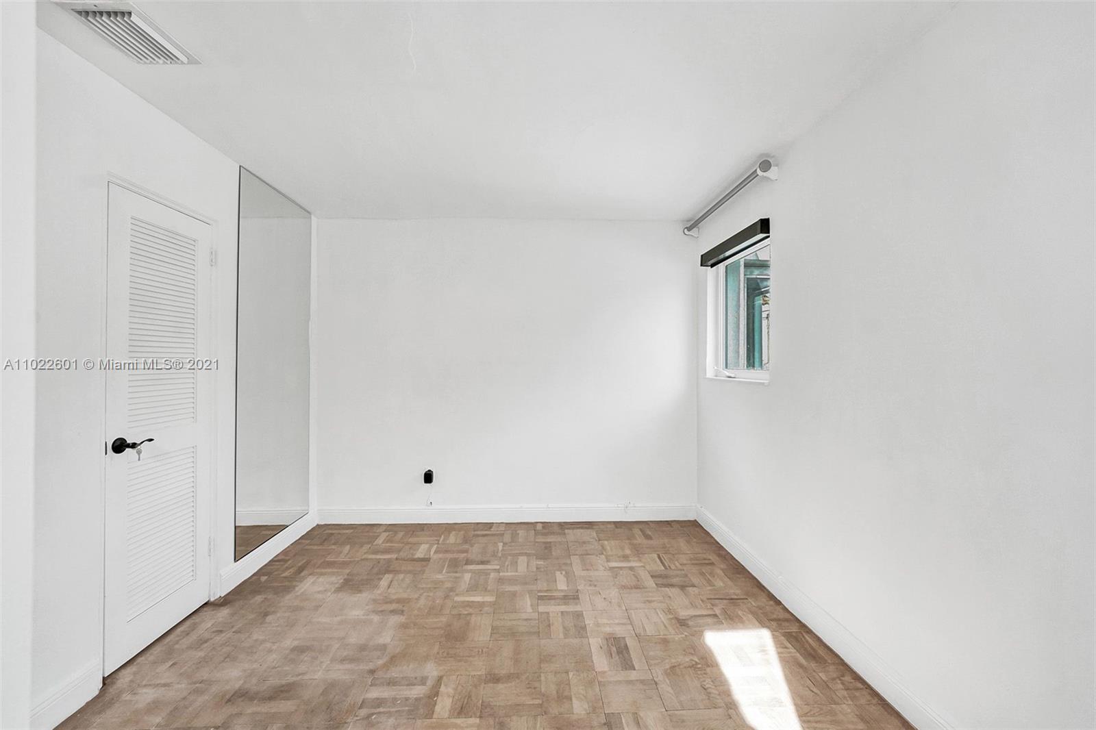 4717 Alton Road Miami Beach, FL 33140 - Photo 45 of 59 a view of a room with white walls