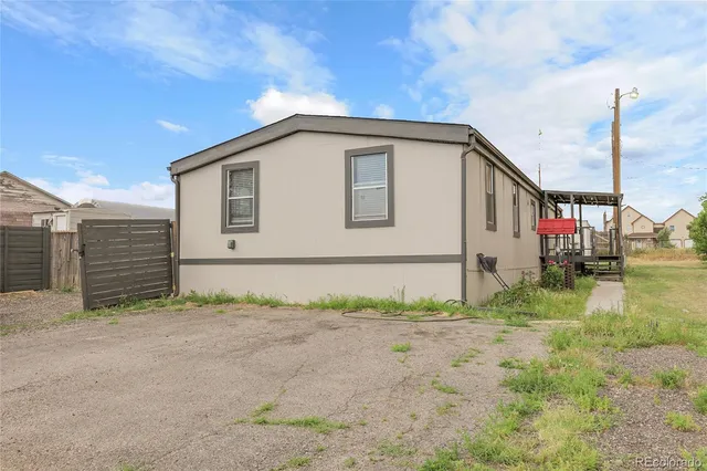 a house view with a backyard space