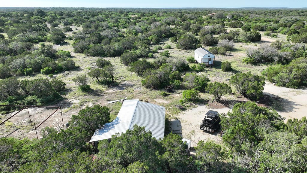 93 J S Murry Ranch Road Del Rio, TX 78840 - Photo 8 of 36 an aerial view of a house with a yard
