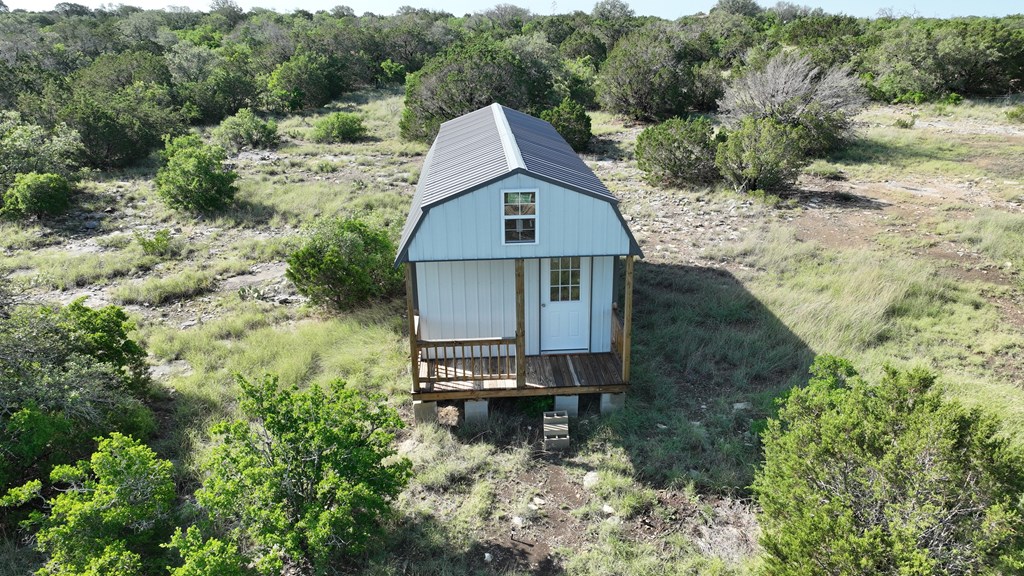 93 J S Murry Ranch Road Del Rio, TX 78840 - Photo 9 of 36 an aerial view of a house with a yard