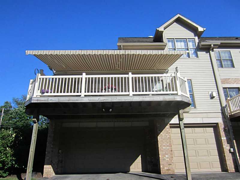 77 Shenot Road Wexford, PA 15090 - Photo 2 of 25 Exterior Back. Retractable awning over the sprawling deck.