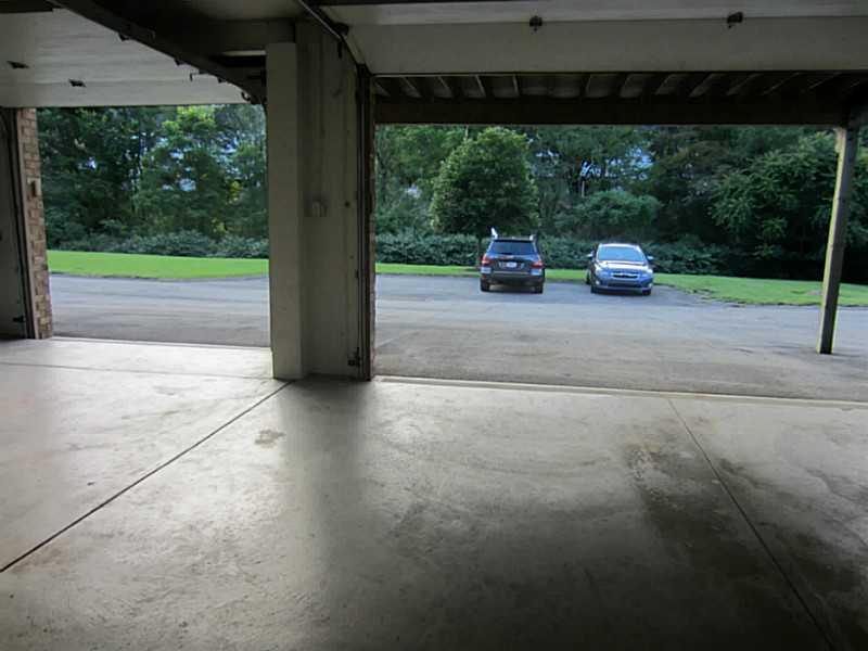 77 Shenot Road Wexford, PA 15090 - Photo 3 of 25 Parking Lot/Garage. Three (3) integral garage with stationary tube and extra high ceilings.