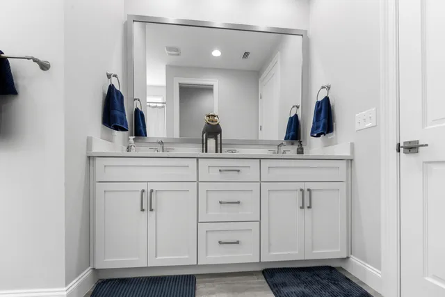 a living room with furniture kitchen view and a dining table