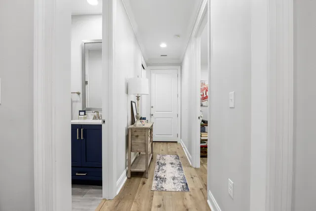 a bedroom with furniture and flat screen tv