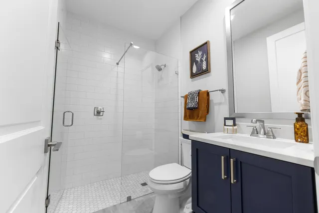 a spacious bedroom with a bed and a window