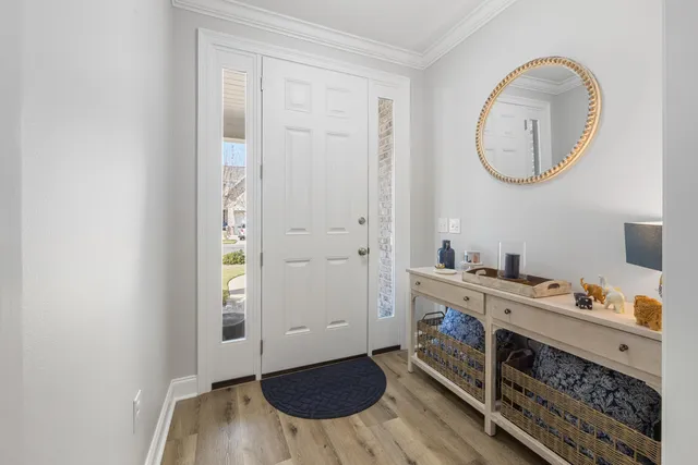 a bathroom with a sink vanity and mirror