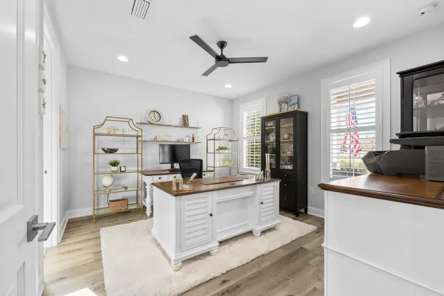 a bathroom with a sink a mirror and a shower