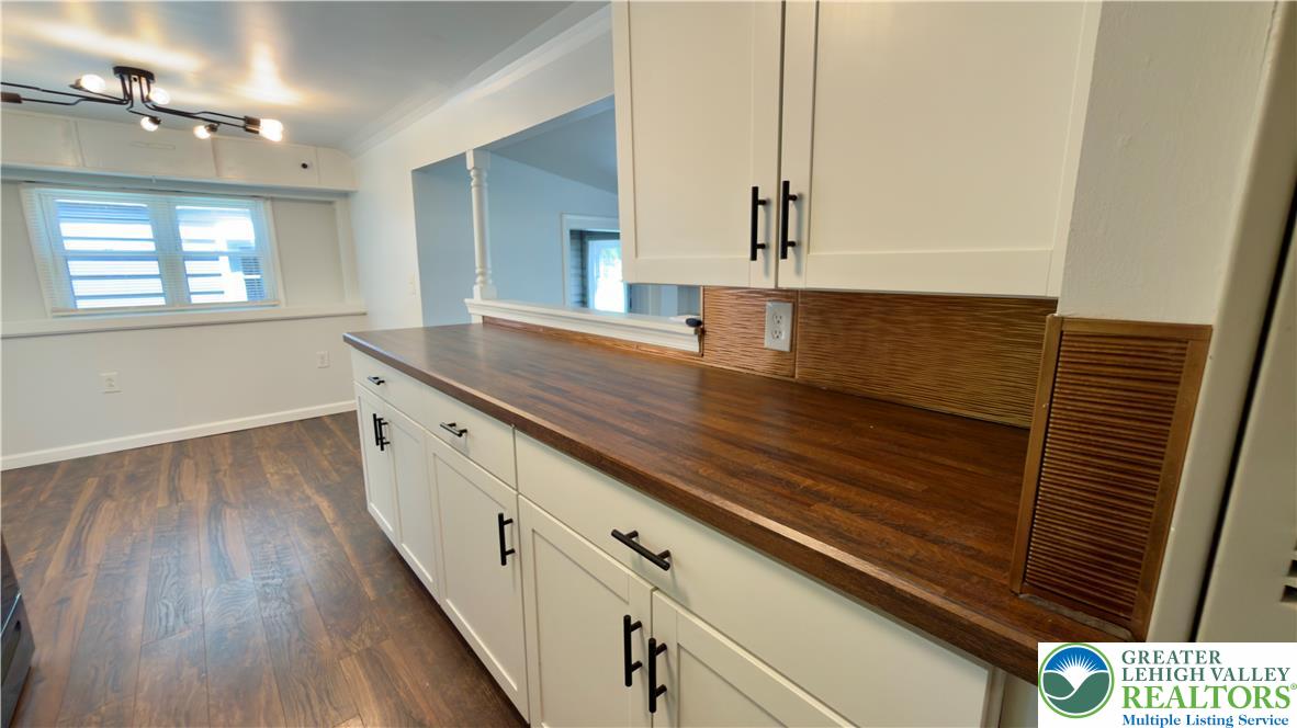 246 Poplar Street Bath, PA 18014 - Photo 21 of 34 Well-appointed kitchen featuring hardwood floors and rich wooden countertops.