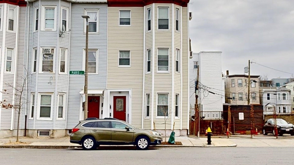 329 Paris Street, Unit 2 Boston, MA 02128 - Photo 24 of 24 a car parked in front of a building