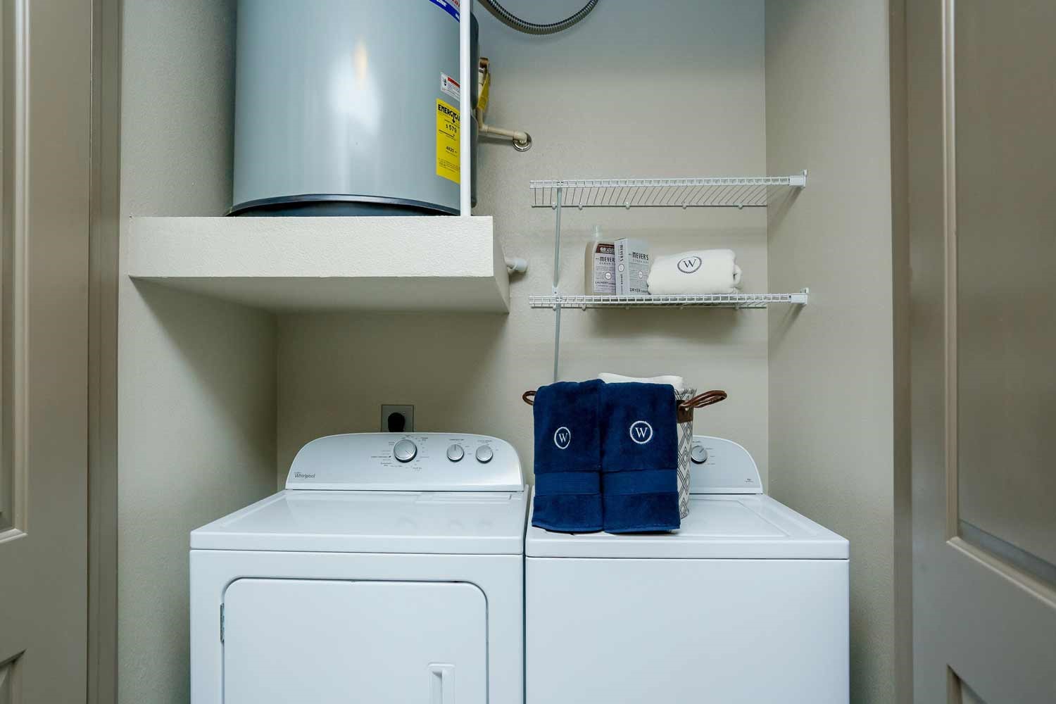 2033 South Gessner Road, Unit 4312 Houston, TX 77063 - Photo 8 of 25 a utility room with dryer and washer