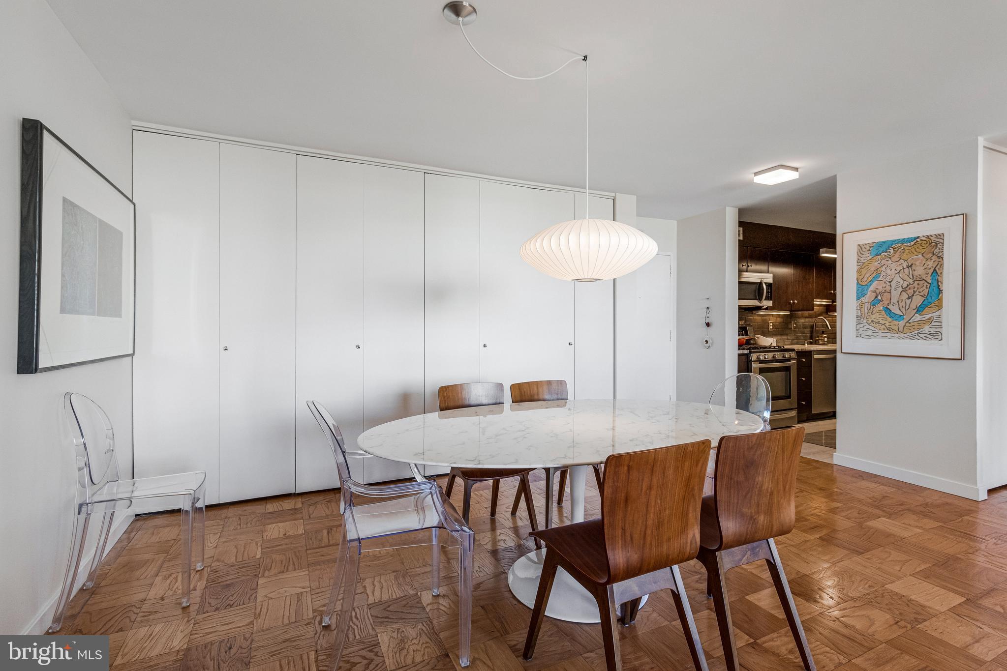 1245 4th Street Southwest, Unit E501 Washington, DC 20024 - Photo 14 of 40 a view of a dining room with furniture