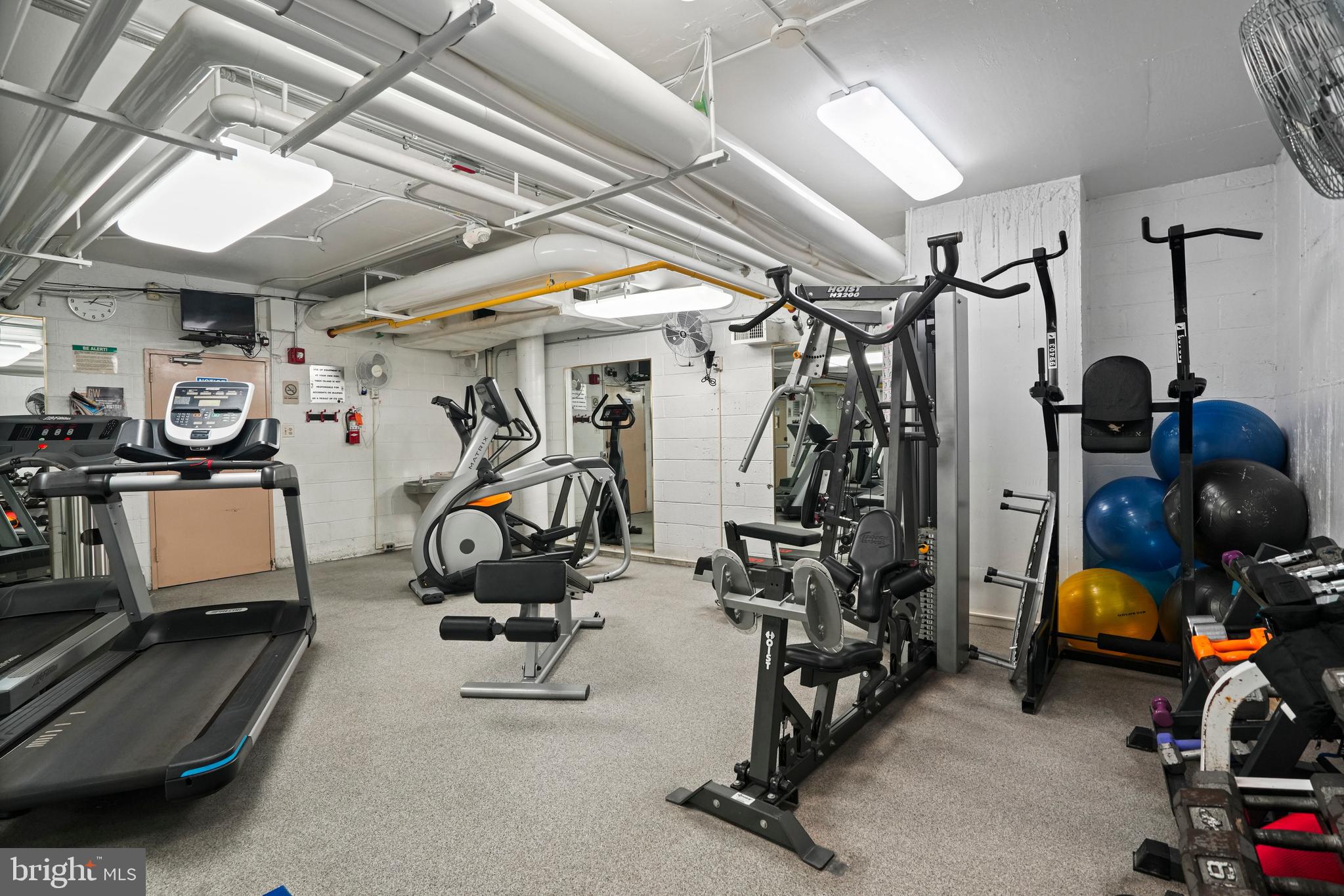 1245 4th Street Southwest, Unit E501 Washington, DC 20024 - Photo 27 of 40 a view of a room with gym equipment