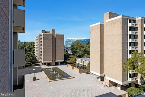 a picture of a building with a yard