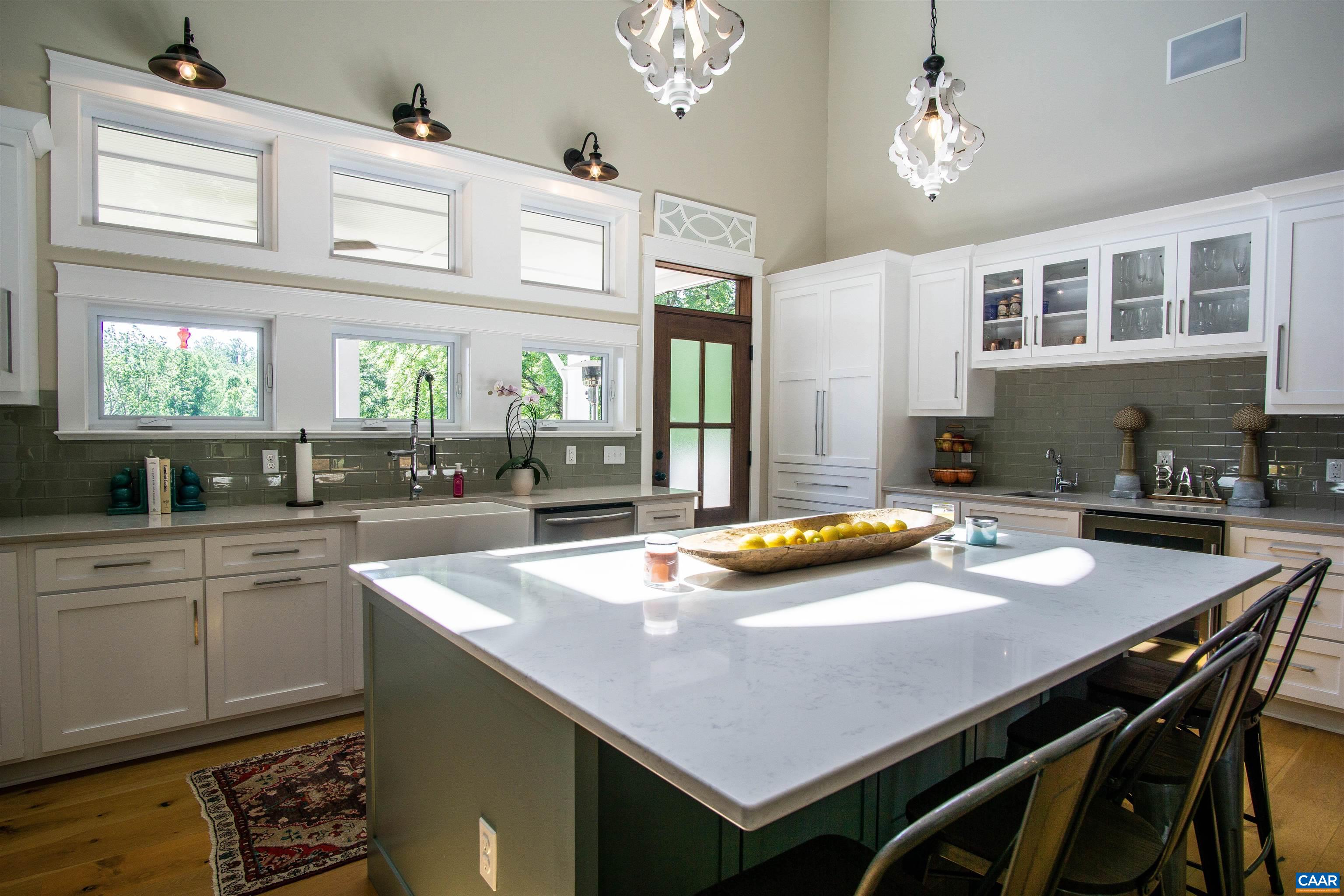 2236 Moore Road Ruckersville, VA 22968 - Photo 16 of 69 a kitchen with a table chairs and window