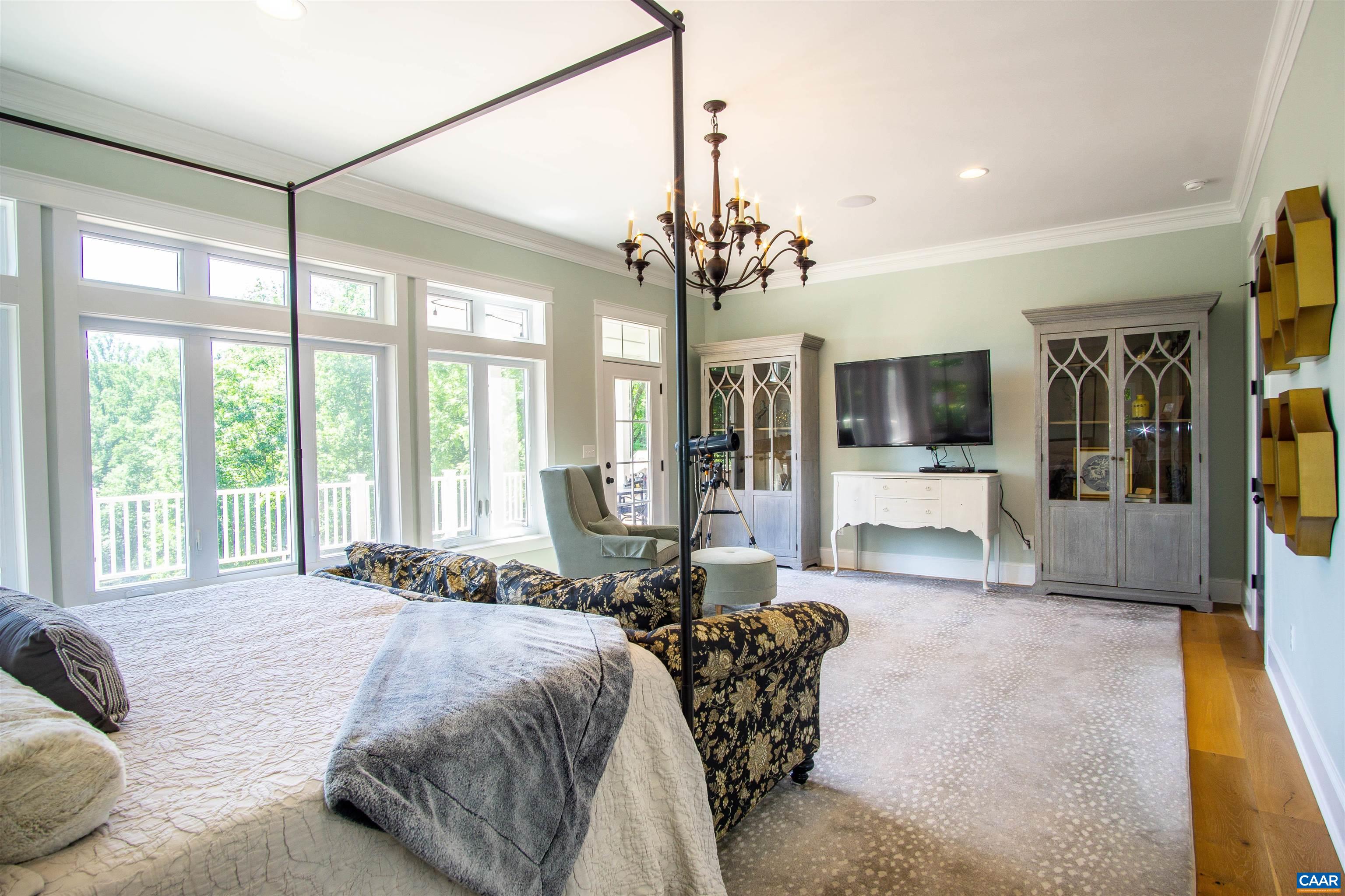 2236 Moore Road Ruckersville, VA 22968 - Photo 22 of 69 a spacious bedroom with a bed mirror and window