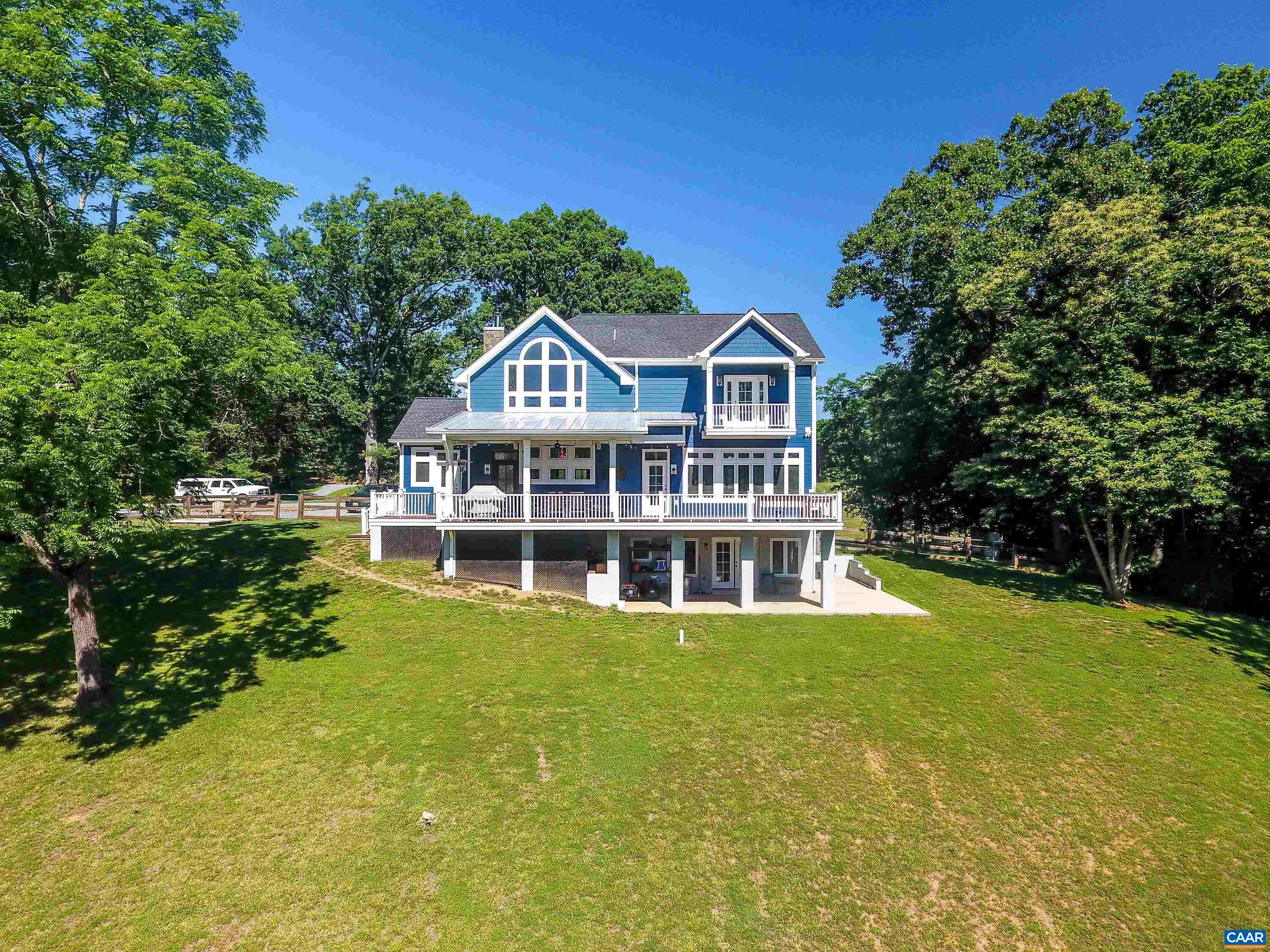 2236 Moore Road Ruckersville, VA 22968 - Photo 62 of 69 a view of a house with a big yard and large trees