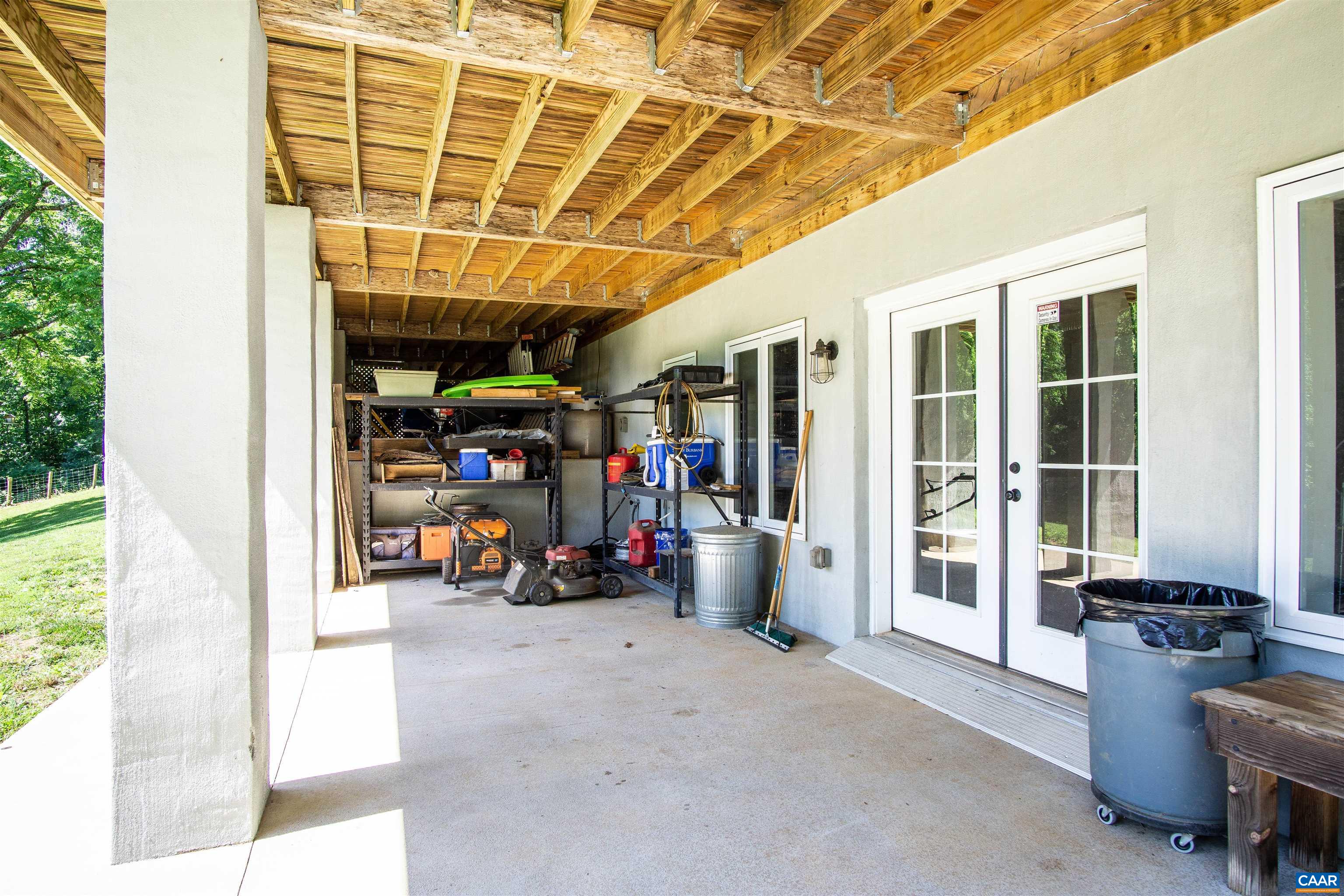 2236 Moore Road Ruckersville, VA 22968 - Photo 64 of 69 a view of a garage with rack and bicycle