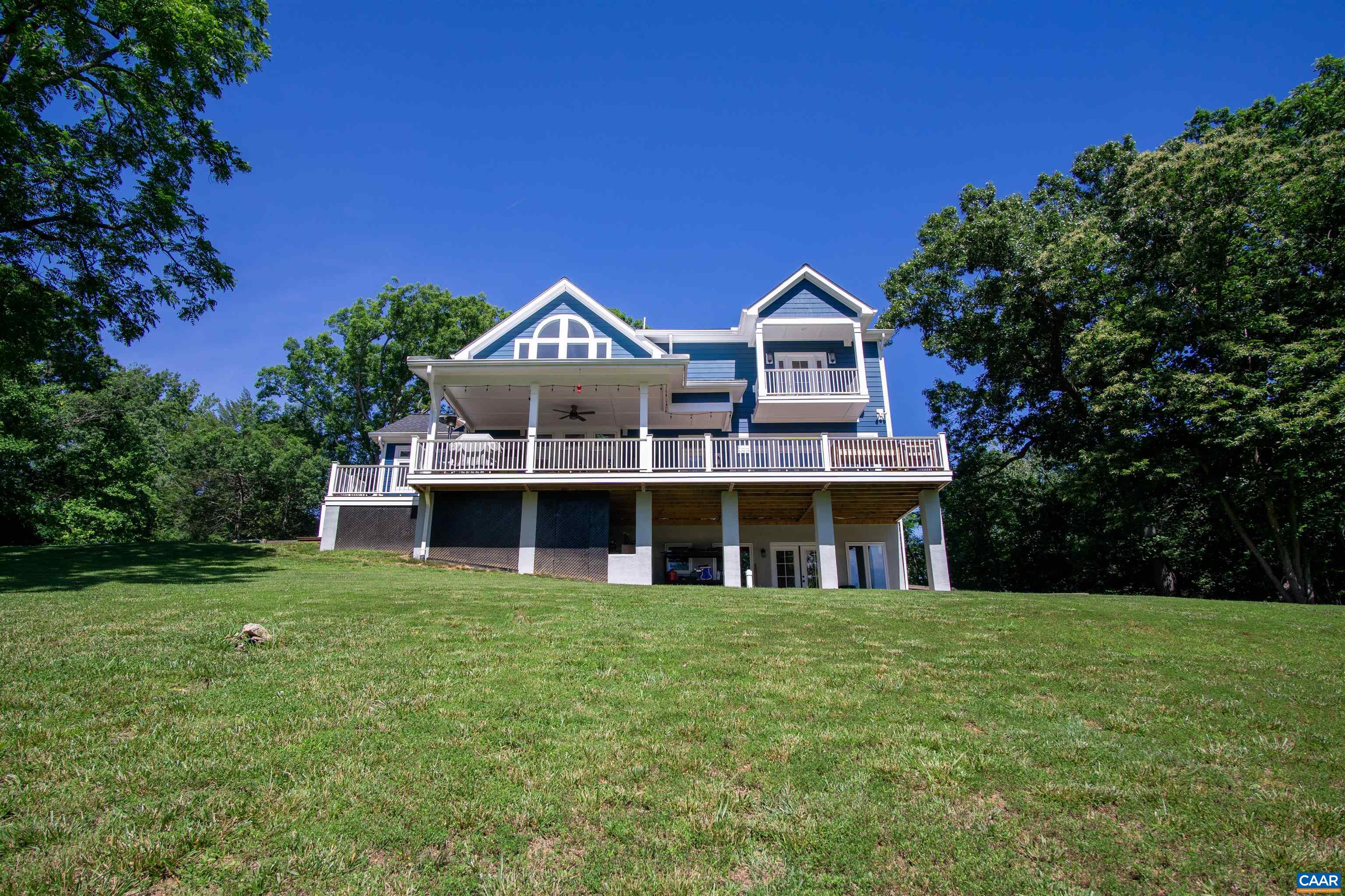 2236 Moore Road Ruckersville, VA 22968 - Photo 65 of 69 a front view of a house with a garden