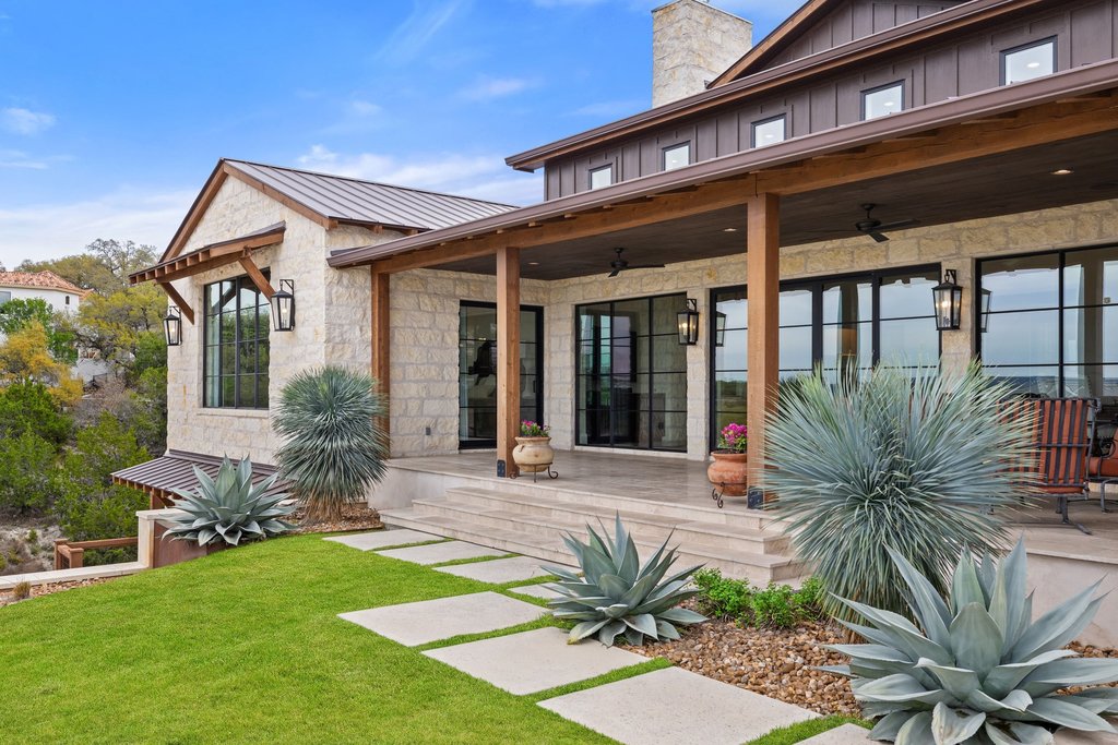 4001 Tejon Circle Austin, TX 78734 - Photo 11 of 40 a front view of house and yard with green space