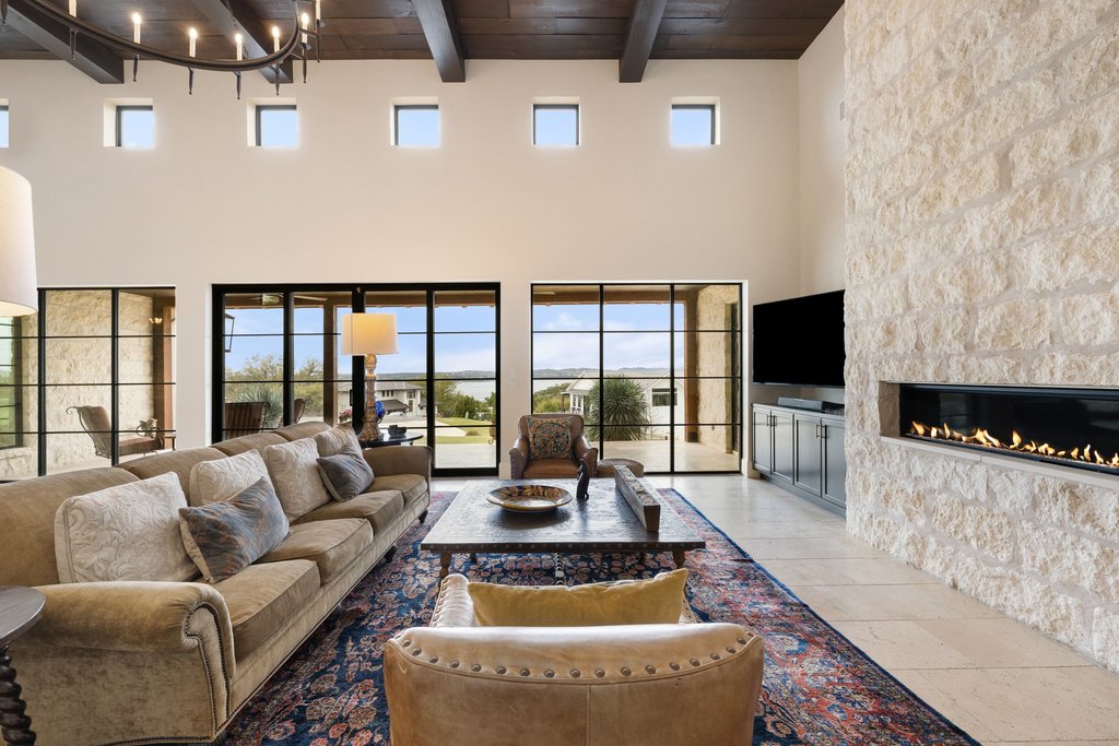4001 Tejon Circle Austin, TX 78734 - Photo 17 of 40 a living room with furniture and a flat screen tv