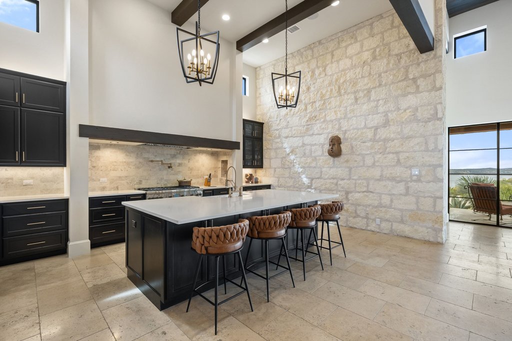 4001 Tejon Circle Austin, TX 78734 - Photo 20 of 40 a kitchen with a sink and cabinets