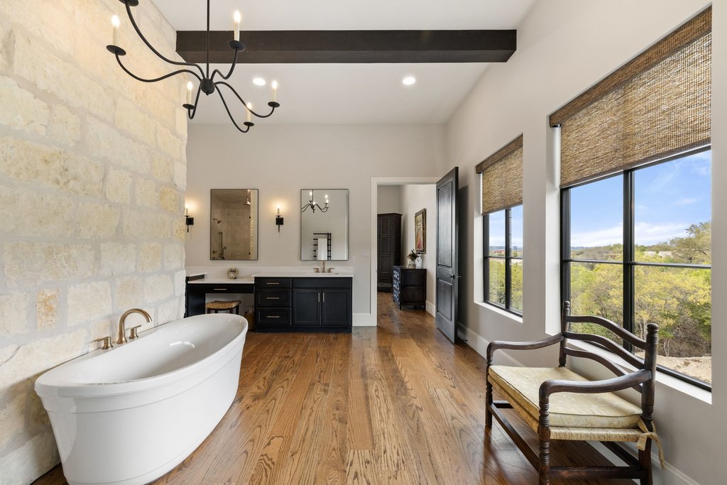 4001 Tejon Circle Austin, TX 78734 - Photo 25 of 40 a large room with a couch and a view of living room