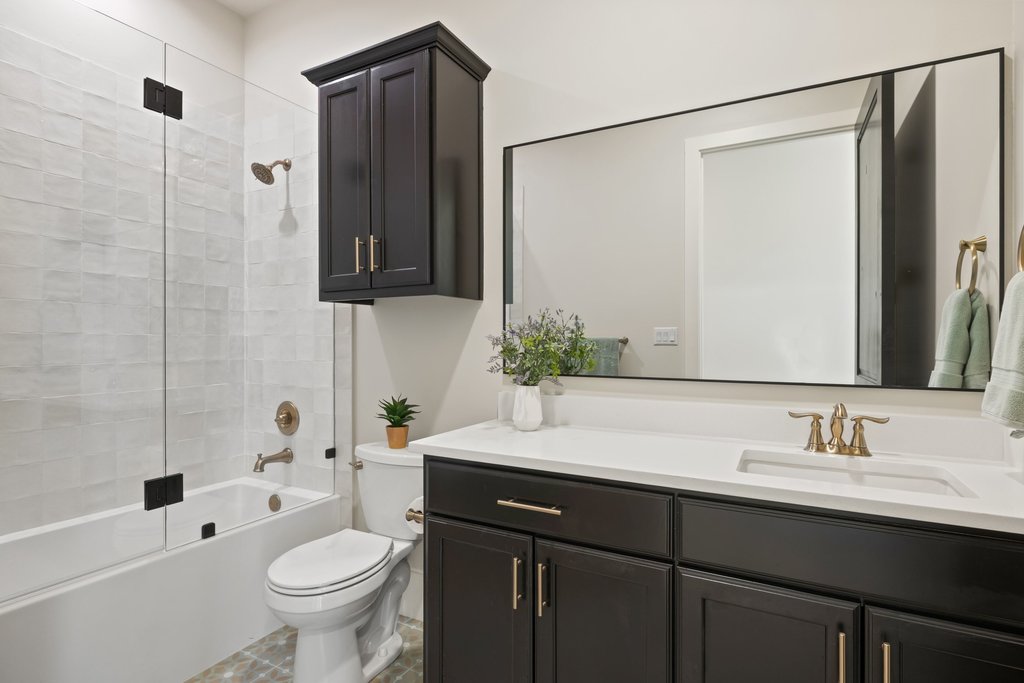 4001 Tejon Circle Austin, TX 78734 - Photo 36 of 40 a bathroom with a sink and a mirror