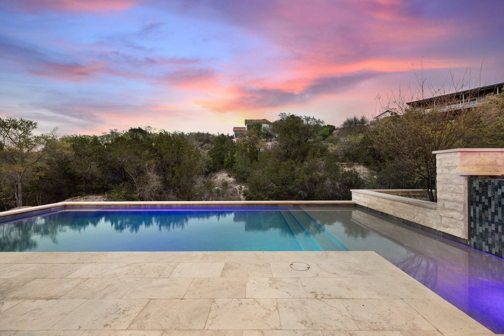 4001 Tejon Circle Austin, TX 78734 - Photo 6 of 40 a view of a swimming pool and mountain
