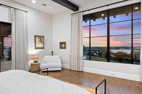 a view of a balcony with stainless steel appliances