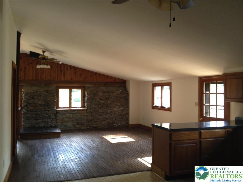 810 Dragonhead Way Stroudsburg, PA 18360 - Photo 15 of 21 a view of an empty room with wooden floor and a window